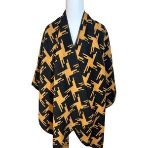 Geometric Print Poncho in black and gold one size.
